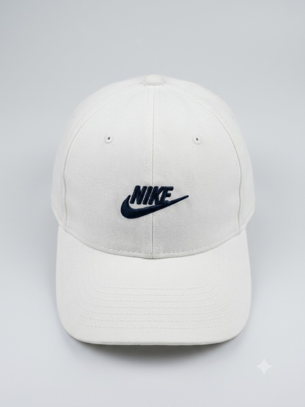 Nike White Baseball Cap with Navy Embroidered Swoosh